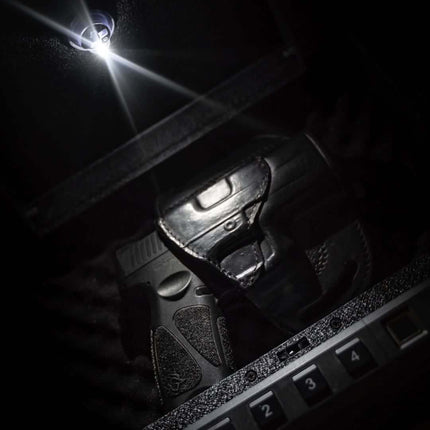 Adhesive Button Lamp light on the roof of a firearm storage case