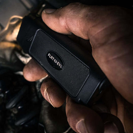 Hand holding Flat-Eye Flashlight